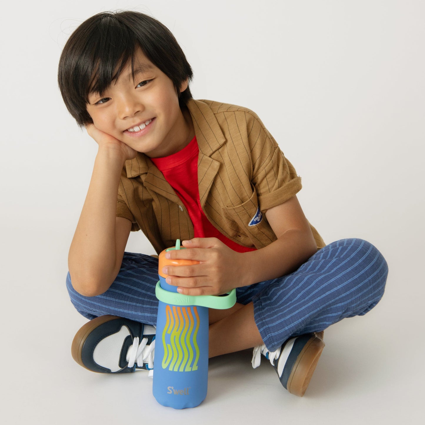 traveler-with-flip-straw-lid-16oz-s5 Swell-Kids-Water-Bottle-Traveler-16oz-Blue-Chill-Lifestyle.jpg